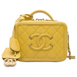 Borsa Vanity Chanel Small Caviar CC Filigree gialla