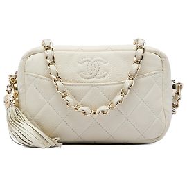 Borsa a tracolla Chanel Mini Quilted Caviar Coco Tassel Camera Case Bianca