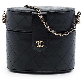 Clutch Vanity rotonda Chanel CC in pelle di agnello matelassé nera con catena