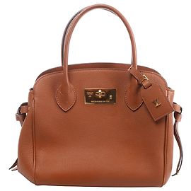 Borsa Louis Vuitton Milla PM Taurillon in Brown M51684