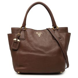 Bolso tote convertible Prada en Vitello Daino marrón con bolsillo lateral