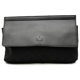Borsetta cintura Gucci in tela GG e pelle nera con fascia Web