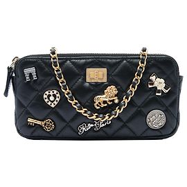 Clutch Double Zip con Cadena Chanel Reissue 2.55 en Cuero Aged Calfskin Acolchado Negro Lucky Charms