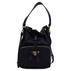 Prada Borsa a secchiello e borsa a tracolla Bella in tessuto blu navy con metallo dorato