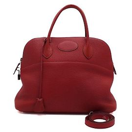 Hermès Saco Tote em couro vermelho com ferragens prateadas Bolide