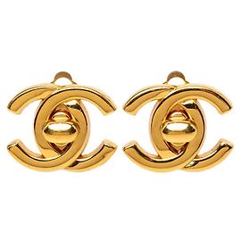 Brincos de pressão vintage Chanel Coco Mark Turnlock