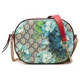 Borsa a tracolla con catena Gucci GG Supreme Blooms rossa