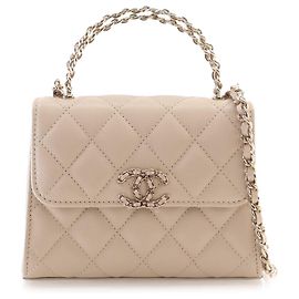 Borsa Chanel Nano CC trapuntata in pelle Caviar marrone con manico Coco