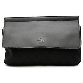 Sac ceinture Gucci GG Canvas et cuir noir avec bande Web