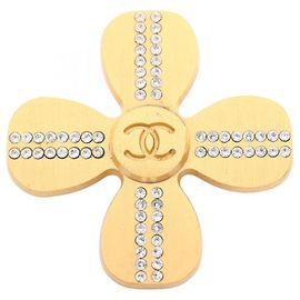Broche Chanel Coco Mark plaquée or