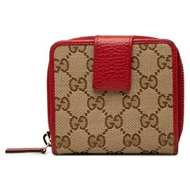Cartera bi-fold Gucci GG Canvas