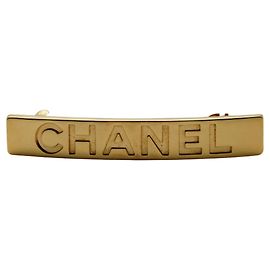 Fermi capelli dorati Chanel da donna
