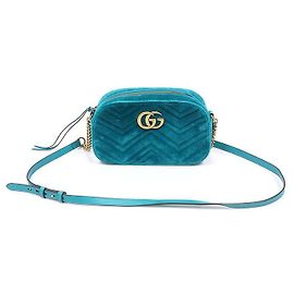 Gucci Borsa a spalla piccola con catena GG Marmont in velluto blu petrol con motivo chevron