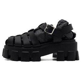 Prada Sandali da donna Monolith in gomma schiumosa con logo triangolare in pelle nera