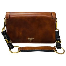 Sac à épaule Prada en cuir de veau Antik Soun Cuoio Ebano marron avec plaque logo