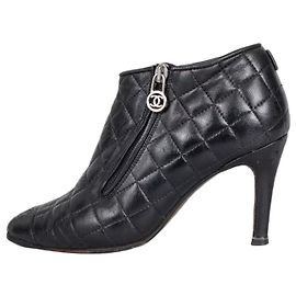 CHANEL Black Quilted Leather Zip Ankle Boots 37.5 Pre-owned