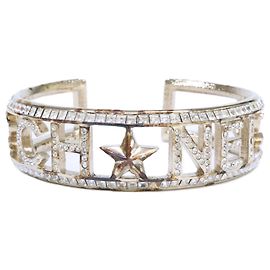 Chanel Armreif Hellgold mit Strass-Logo