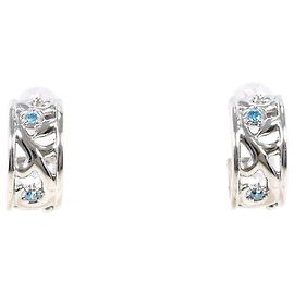 Autre Marque Orecchini a mezzo cerchio in oro bianco 18K con diamanti blu