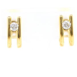 Autre Marque Orecchini a clip in oro giallo 18K con diamanti