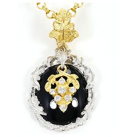 Autre Marque Collana in oro giallo 18K e platino con onice e diamante