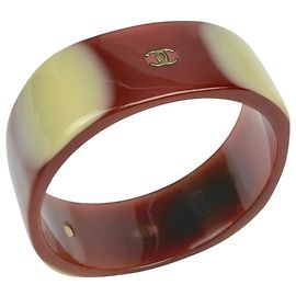 Bangles Chanel in plastica marrone