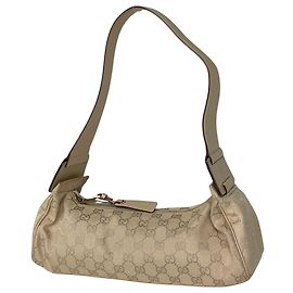 Borsa a tracolla Gucci beige con motivo GG