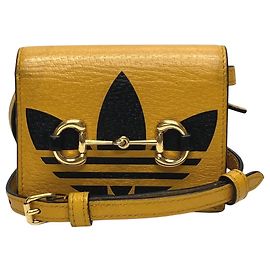Carteira bi-fold Gucci Horsebit em couro amarelo
