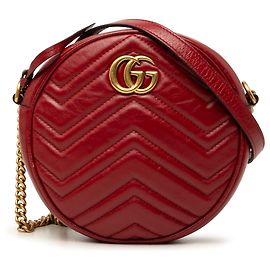Borsa a tracolla rotonda Mini GG Marmont in pelle matelassé rossa Gucci