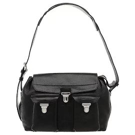 The Lemaire Gear Bag Medium features glossy vegetable-tanned leather with a subtle sheen and a structural silhouette. Its ergonomic, organically curved design provides a natural fit when worn, and