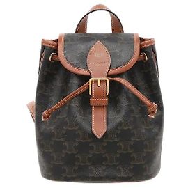 Céline Un lienzo Triomphe clásico armoniza con adornos de cuero color tan para un aire elegante. Su silueta mini compacta es ideal para guardar los artículos esenciales de forma ordenada, y su ligereza la hace...