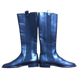 Botas altas Chanel en cuero negro