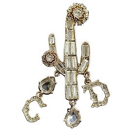 Spilla Christian Dior x Cactus Jack con Cristalli