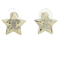 Chanel Clip-Ohrringe Gold und Transparent