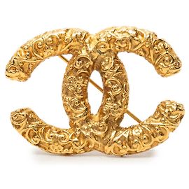 Spilla Chanel Gold CC placcata oro con rilievo barocco