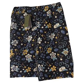 Pantaloncini Gucci con stampa floreale e note musicali