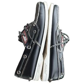 Black leather loafers by Prada