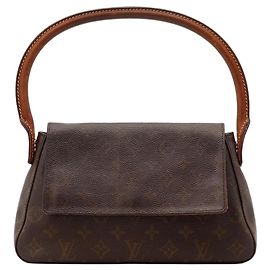 Bolsa Pochette Accessoires em canvas Monogram Louis Vuitton