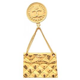 Spilla motivo borsa Matelassé placcata oro Chanel