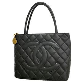 Bolso Tote Chanel de piel de becerro granulada negra