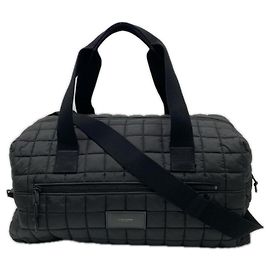 Saco Duffel Nux em nylon preto Yves Saint Laurent