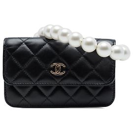 Borsa a tracolla Chanel Maxi Pearls in vitello matelassé nero con catena e clutch