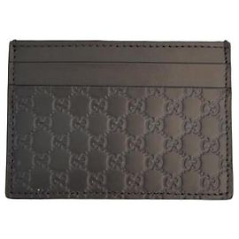 Gucci Portacarte in pelle goffrata GG