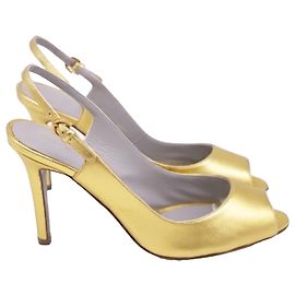 Sandalias Slingback Sergio Rossi en cuero dorado