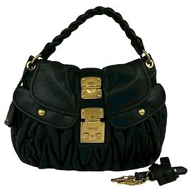 Sac à main en cuir Miu Miu Matelassé avec logo métallique