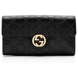 Portafoglio Continental Gucci Guccissima in pelle con G intrecciate