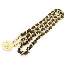 Chanel Cinturón de cadena 1982 con medallón CC negro y metal dorado vintage