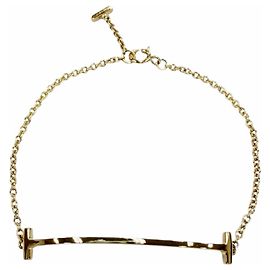 Autre Marque Tiffany & Co. Armband mit Anhängern aus Gelbgold