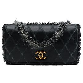 Chanel Black CC Quilted Lambskin Tweedy Flap