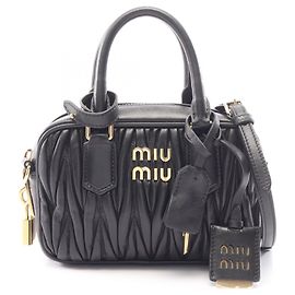 Miu Miu Matelasse 2-Way Handbag in Black Leather