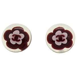 Pendientes de botón Chanel rosa y plata